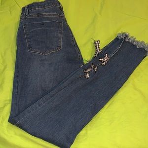 Tractr blu skinny jeans with gingham ribbons and distressed hems